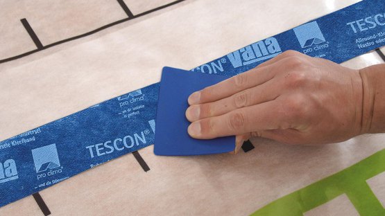 5b. Rubbing the adhesive joint firmly